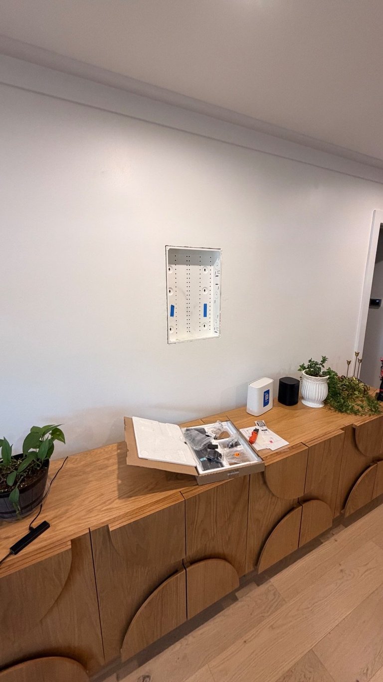 Recessed in-wall outlet box installed behind Samsung Frame TV location