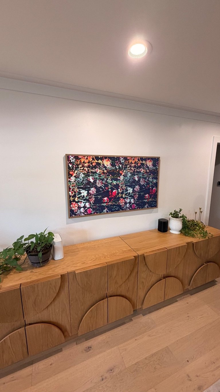 Finished Samsung Frame TV mounted flush to the wall with no visible cables