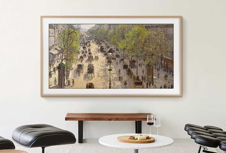 Samsung Frame TV lifestyle display showing artwork in modern living room