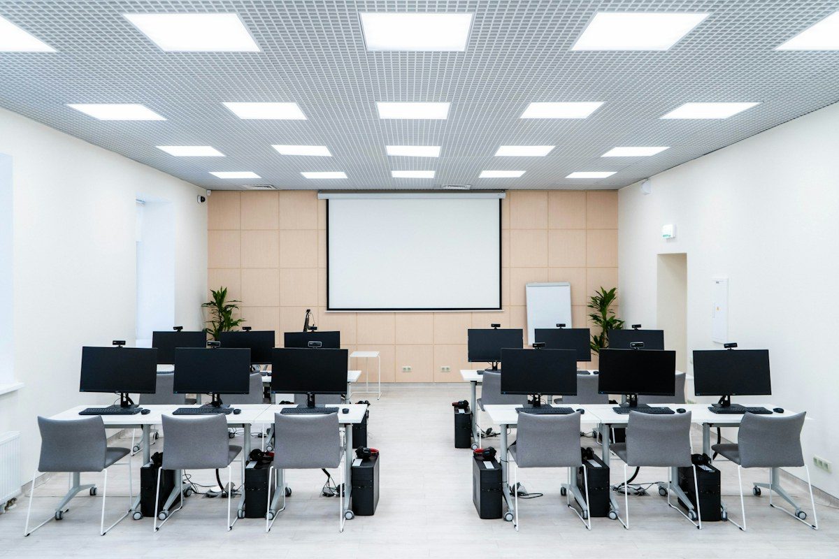 Computer classroom with a screen at the front