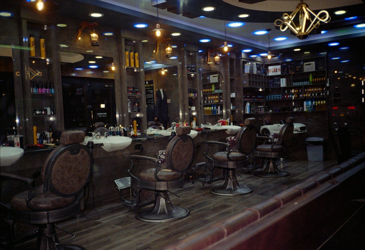 Barbershop with leather chairs and mirrors
