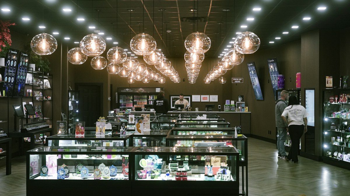 Store with glass display cases and wall screens