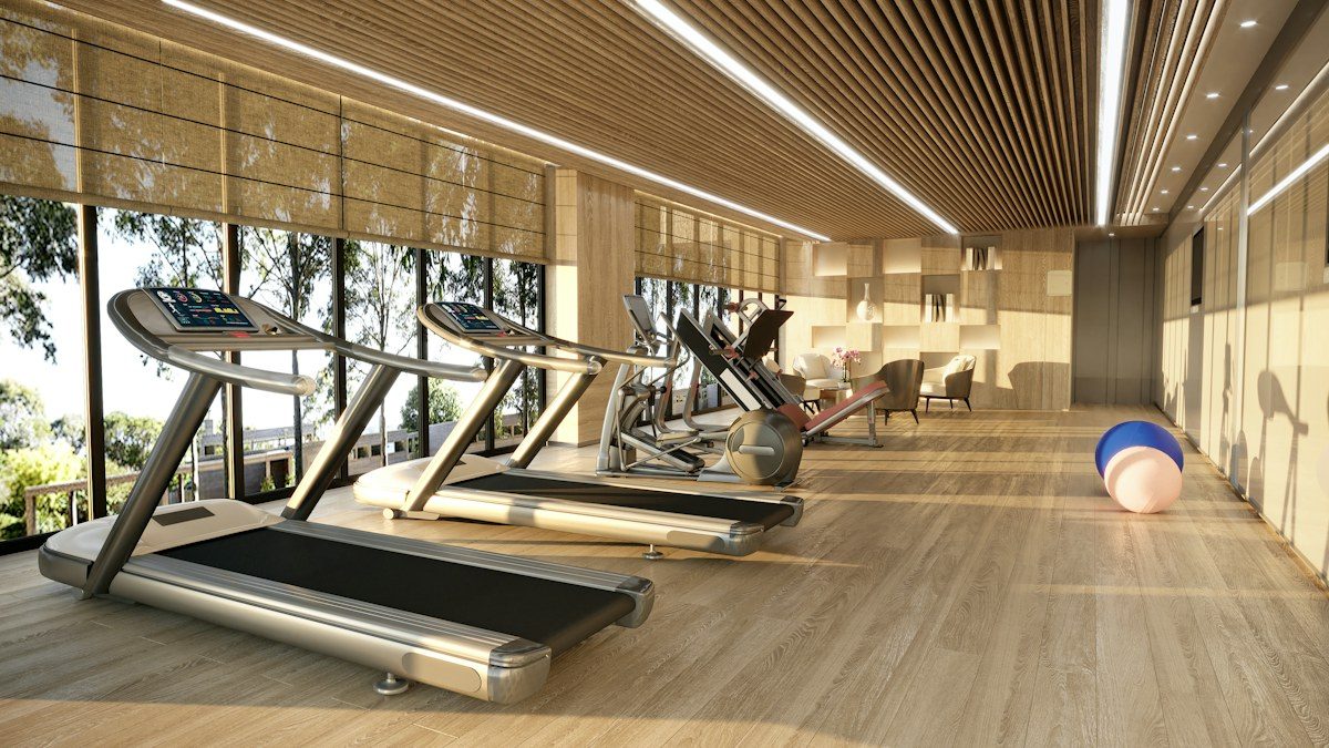 Gym with treadmills under a wood ceiling