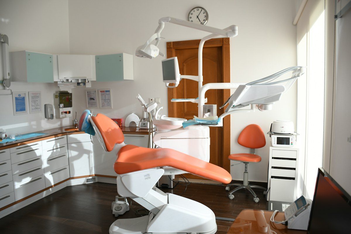 Dental office with a monitor beside the chair