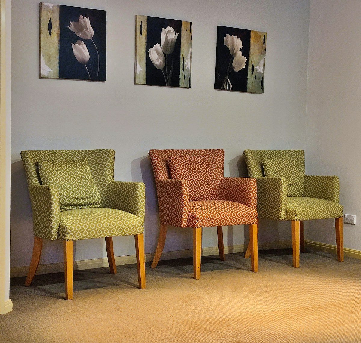 Waiting room with three armchairs