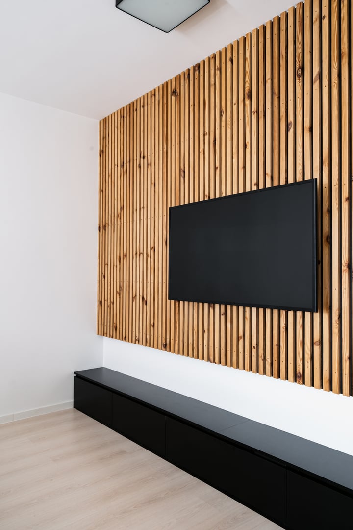 Home cinema, smart tv. Flat screen television is mounted on wall in a contemporary living room